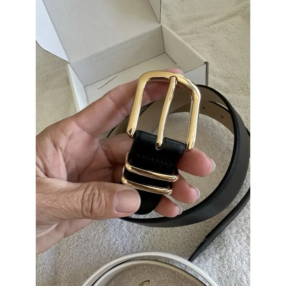 2 Belts. One Black, One White. 95cm. See Pictures For Missing Piece.